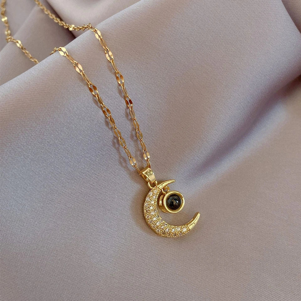 🌙✨ COLLAR LUNA “TE AMO EN 100 IDIOMAS” – EL REGALO MÁS ROMÁNTICO Y ESPECIAL ✨💖