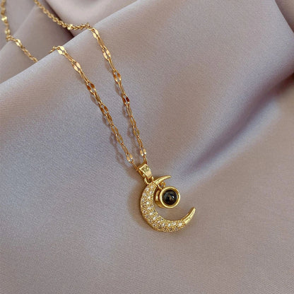 🌙✨ COLLAR LUNA “TE AMO EN 100 IDIOMAS” – EL REGALO MÁS ROMÁNTICO Y ESPECIAL ✨💖